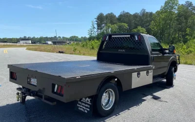 Enhance hauling capabilities with a dovetail bed truck for simplified vehicle transport